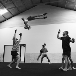 group of acrobats training at the forge